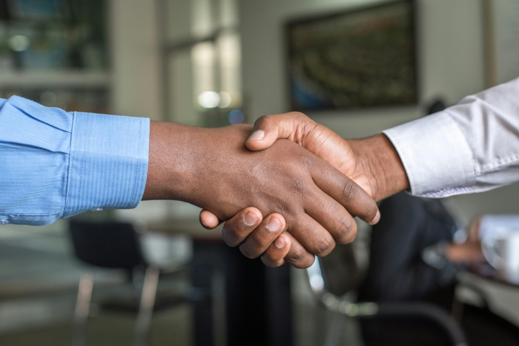 Real estate agent negotiating with client in Nigeria